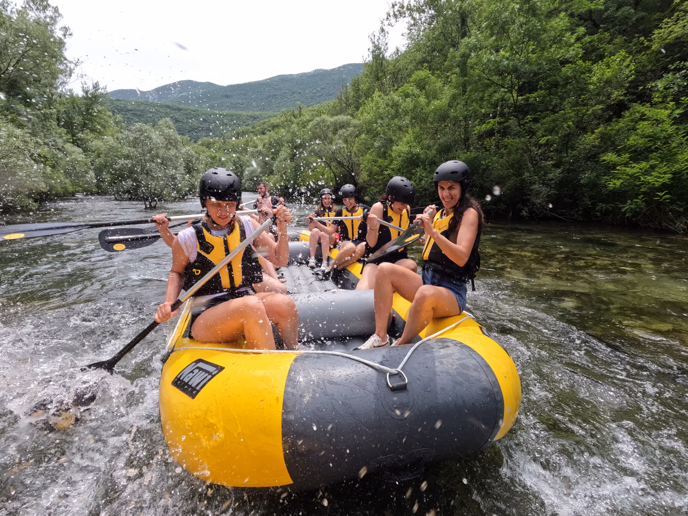 Rafting guide assisting guests on the Cetina river near Omiš